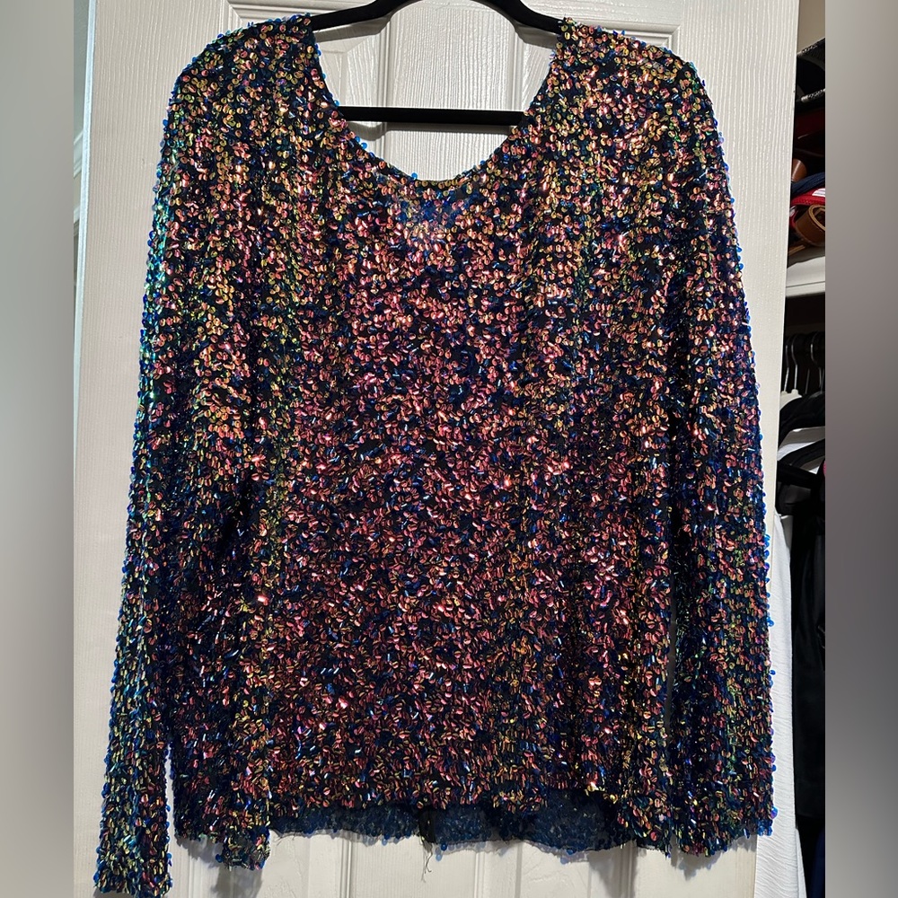 GeeGee 2x sequin blouse with button close on back of neck.